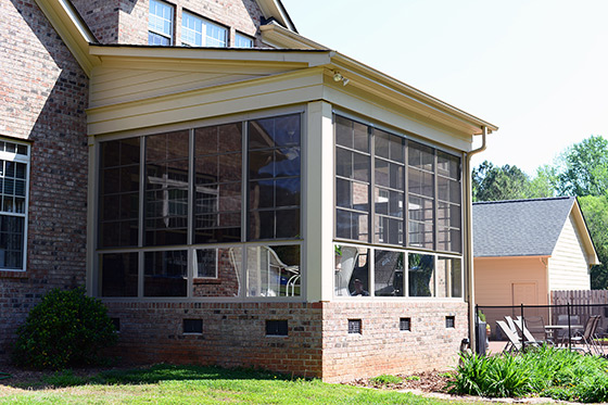 Porch Enclosure with Glass Kneewall and Stacking Porch Windows