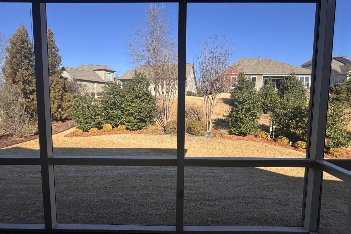 Porch detail before 3-season vinyl-film conversion Creekside Charlotte