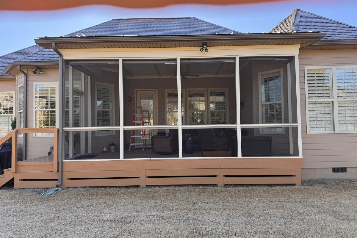 Completed 3-season vinyl-film porch enclosure exterior in Creekside, Charlotte NC
