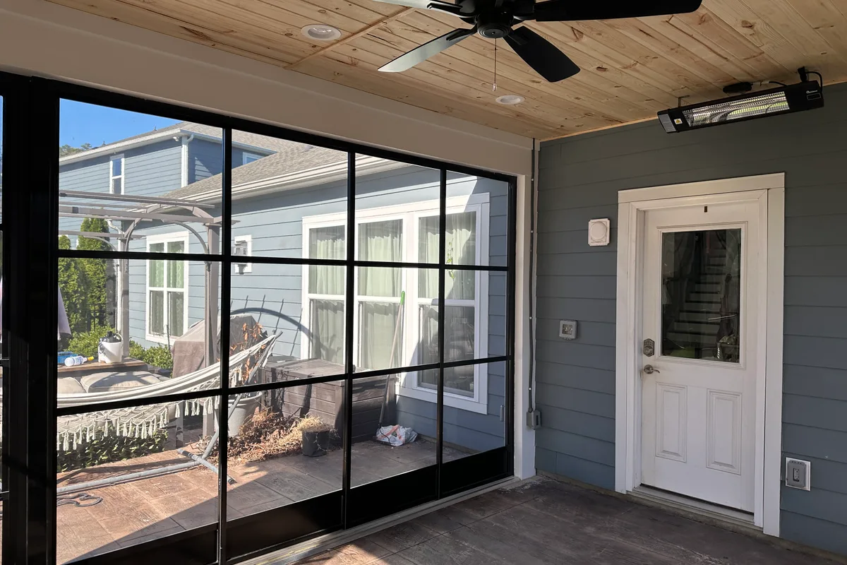 Sunroom addition finished detail showing vinyl enclosure The Ramble Huntersville