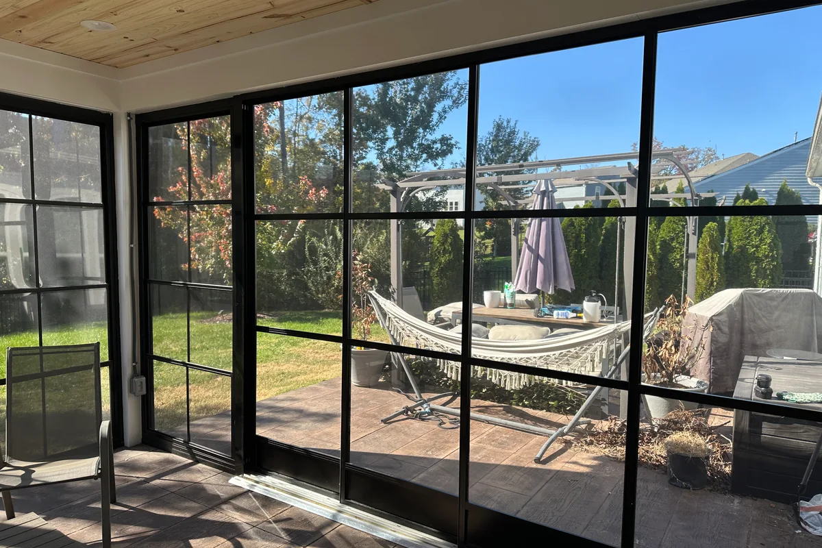 3-season vinyl porch detail view completed addition Huntersville NC contractor