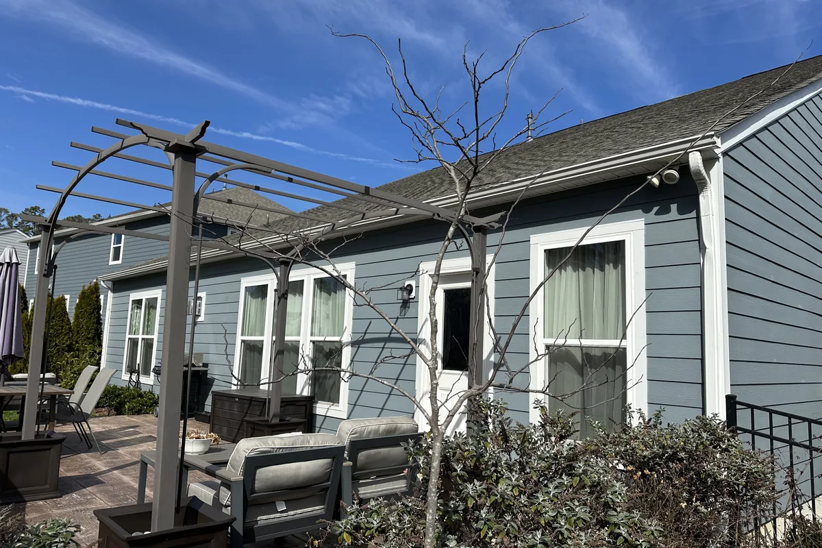 Original porch before vinyl film sunroom installation in Mecklenburg County NC