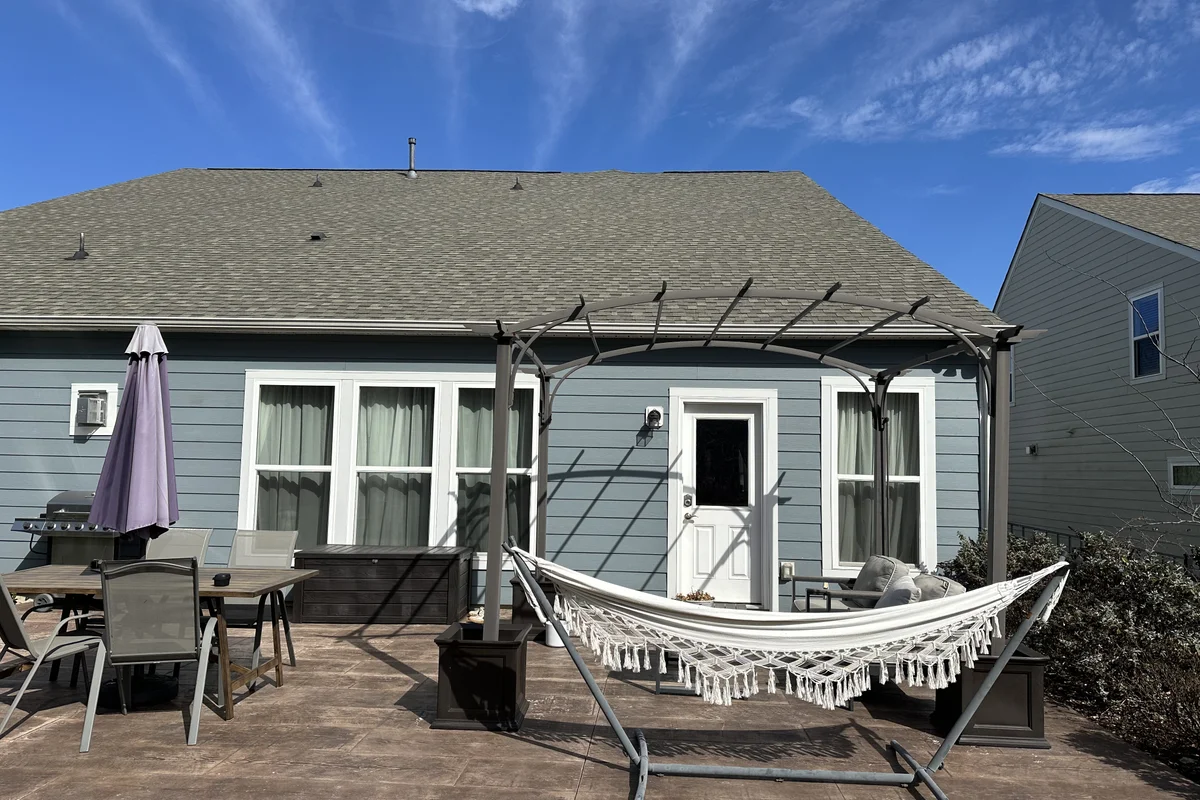 Completed 3-season vinyl porch enclosure exterior at The Ramble in Huntersville NC