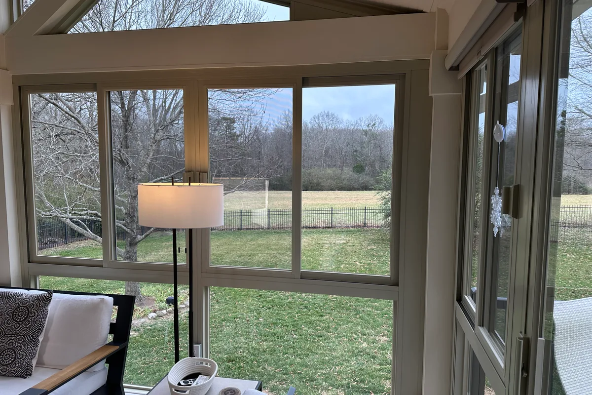 Glass panel detail of finished 3-season room Four Wood Matthews