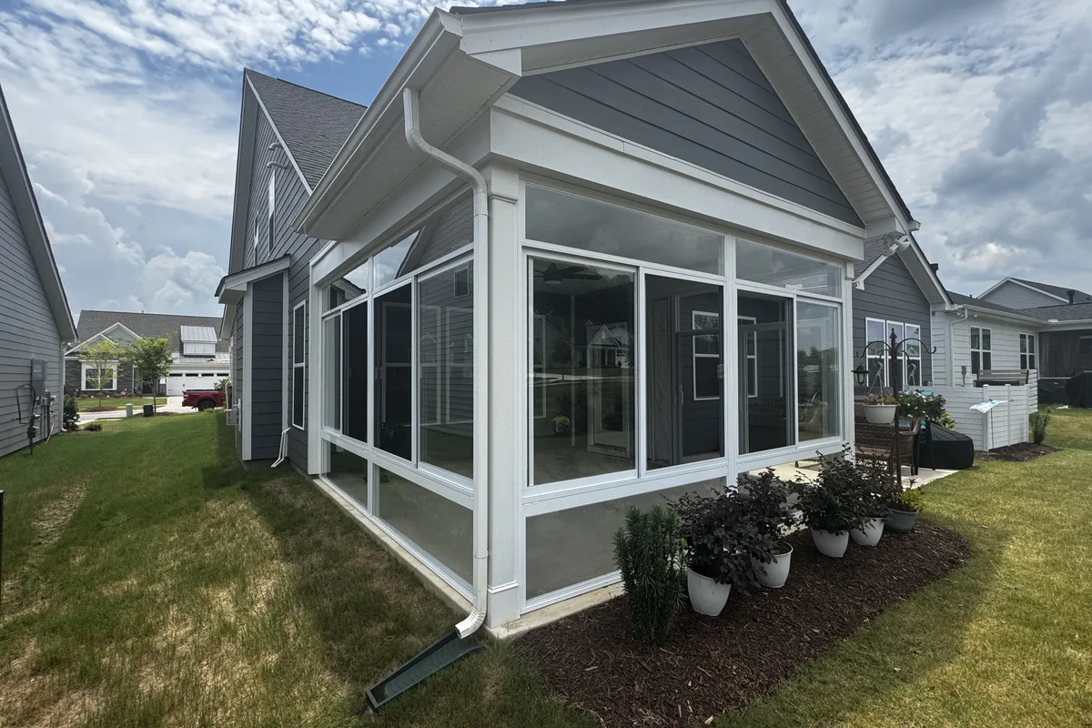 Sliding glass window opened fully on the Mantle Ridge enclosure showing how the panel disappears to allow open air ventilation