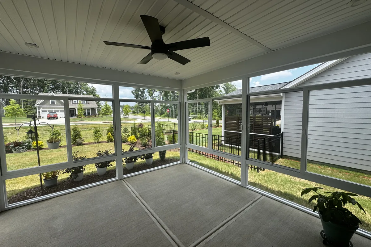 Final view of the Mantle Ridge 3-season glass enclosure project in Indian Trail NC showing the finished porch ready for year round enjoyment