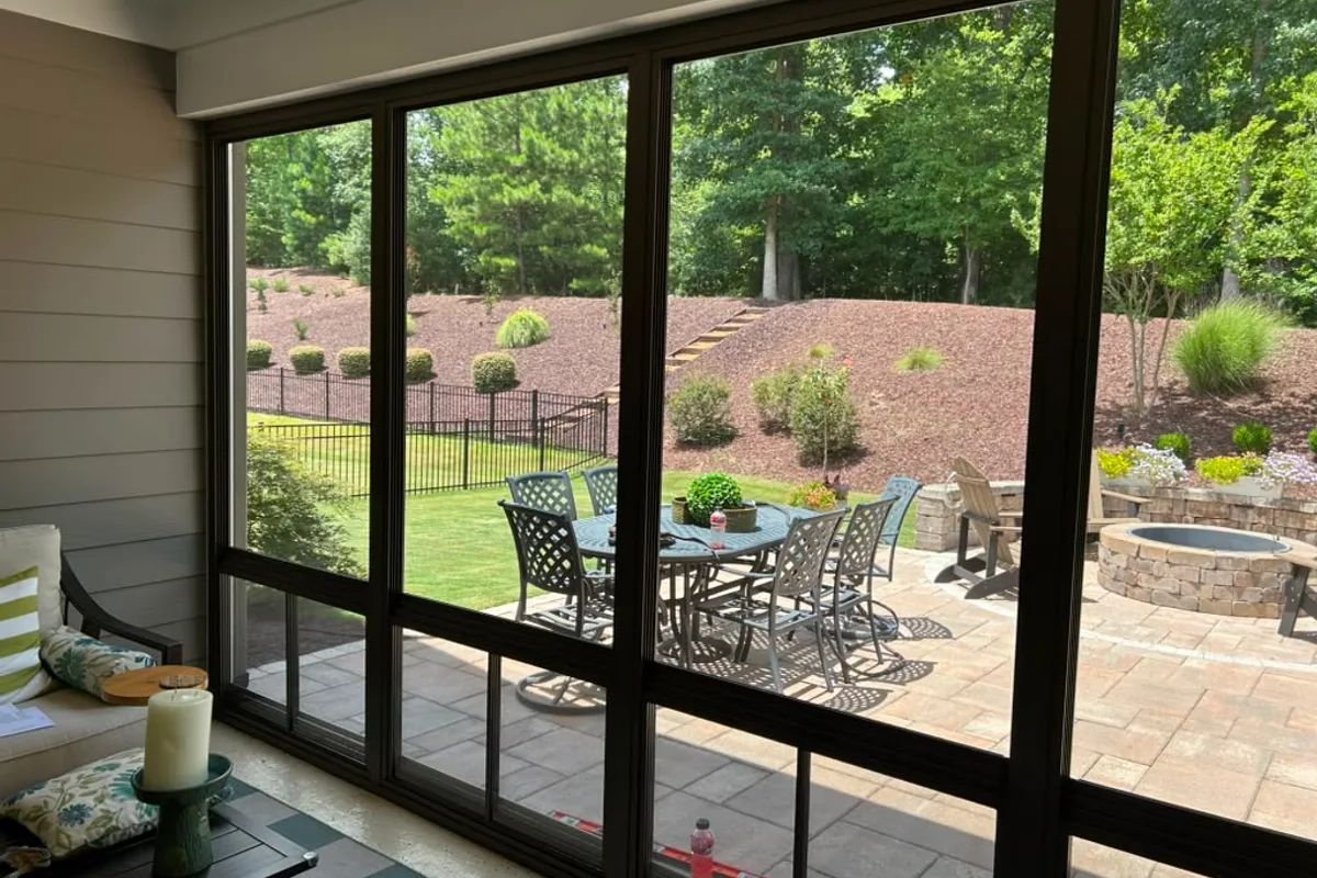 Earthstone aluminum framing detail on 3-season vinyl-film enclosure at Belmont NC property