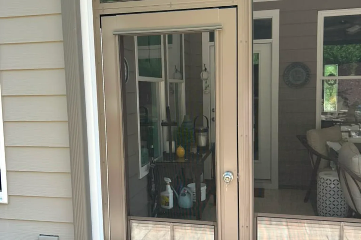 Transom fixed lite above vinyl-film enclosure windows adding natural light in Gaston County NC