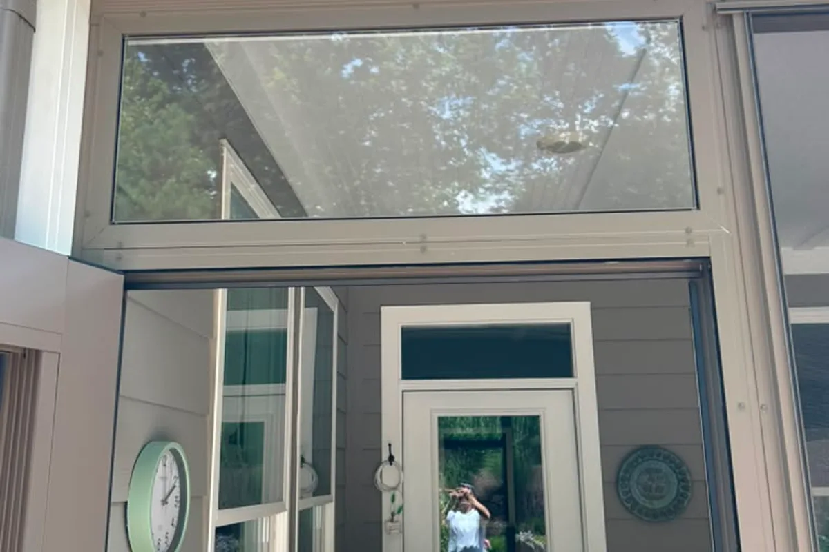 Interior view of completed 3-season vinyl-film porch enclosure in Belmont Gaston County NC