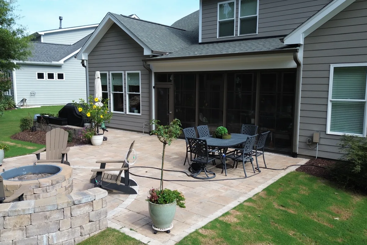 Exterior view of 3-season vinyl-film enclosure blending with existing Belmont NC home architecture