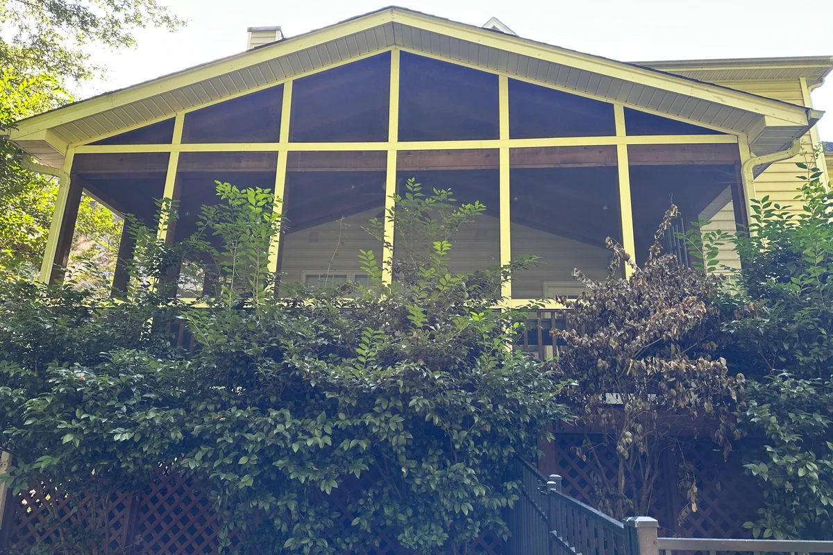 Completed 3-season vinyl film porch enclosure exterior in Brambleton, Charlotte NC