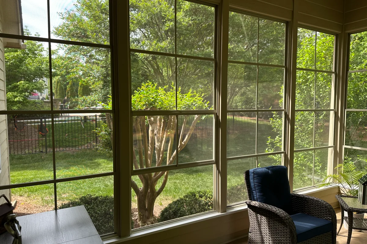 Completed vinyl film porch enclosure detail Camrose Matthews NC
