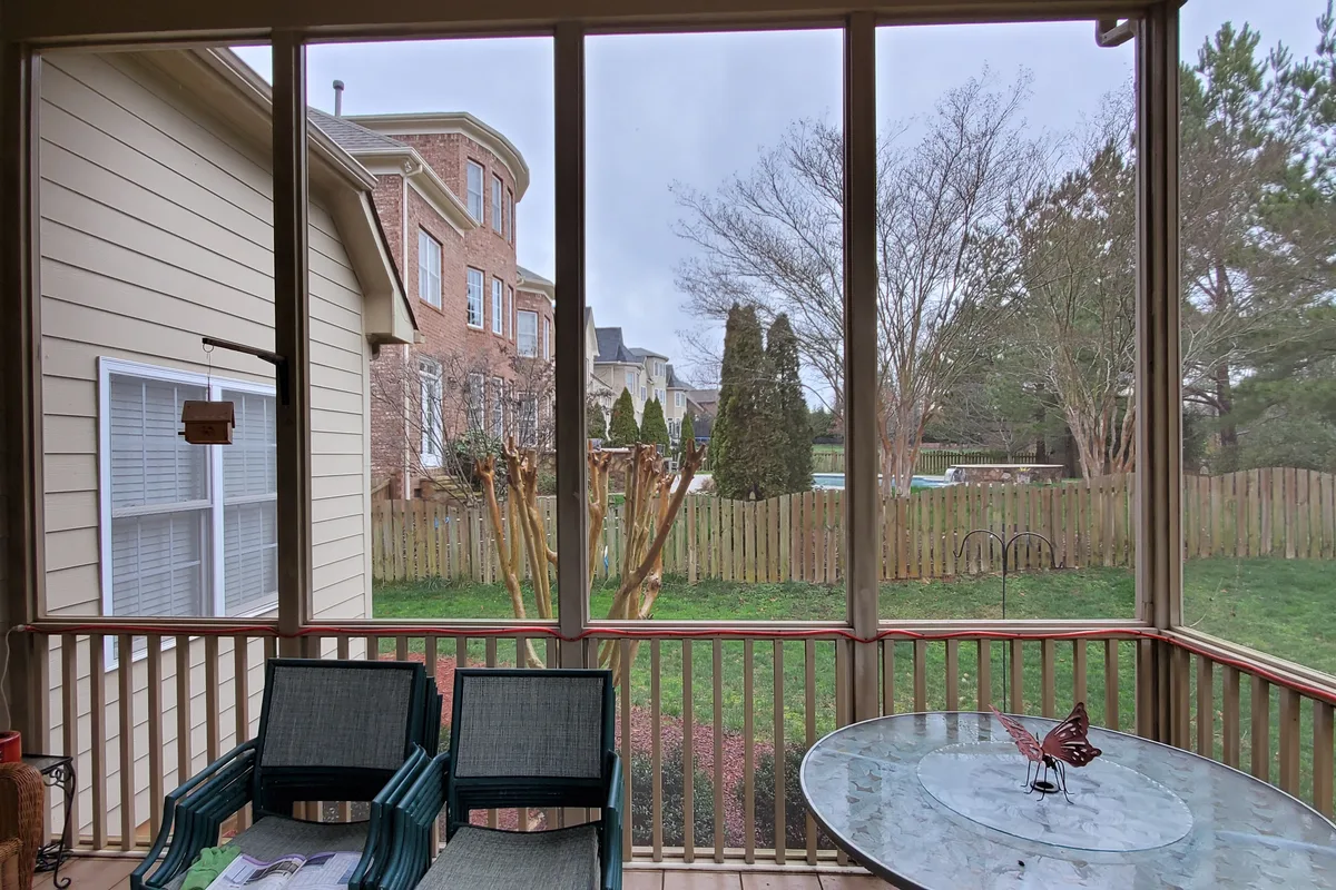 Existing porch structure before vinyl film enclosure installation in Matthews NC
