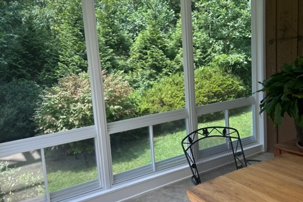 Vinyl enclosure installation detail of 3-season porch Flat Rock NC
