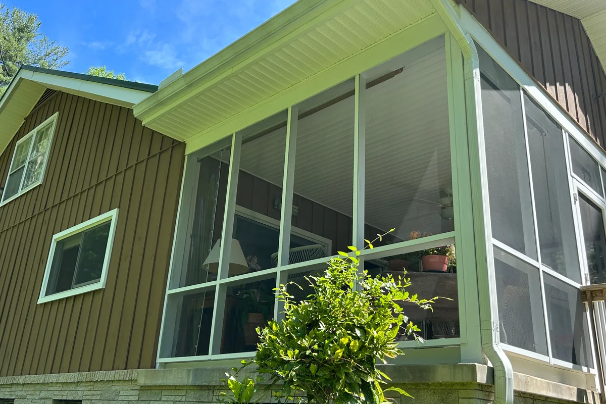Pre-installation view of porch before vinyl film conversion Henderson County