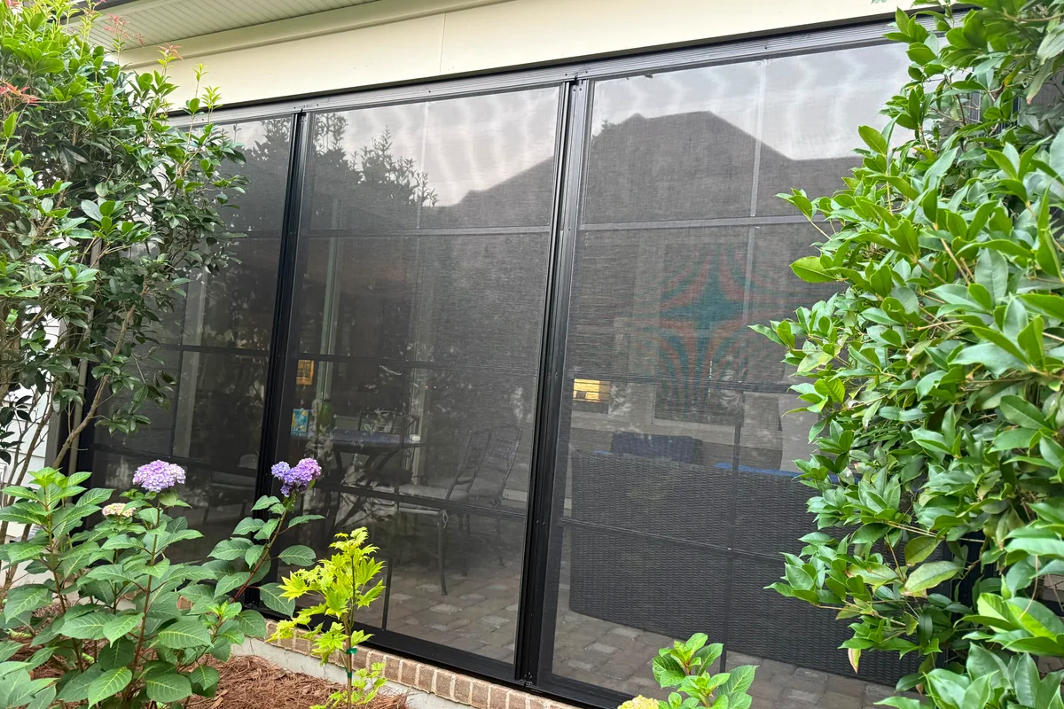 Finished vinyl film porch enclosure detail in Huntersville Mecklenburg County