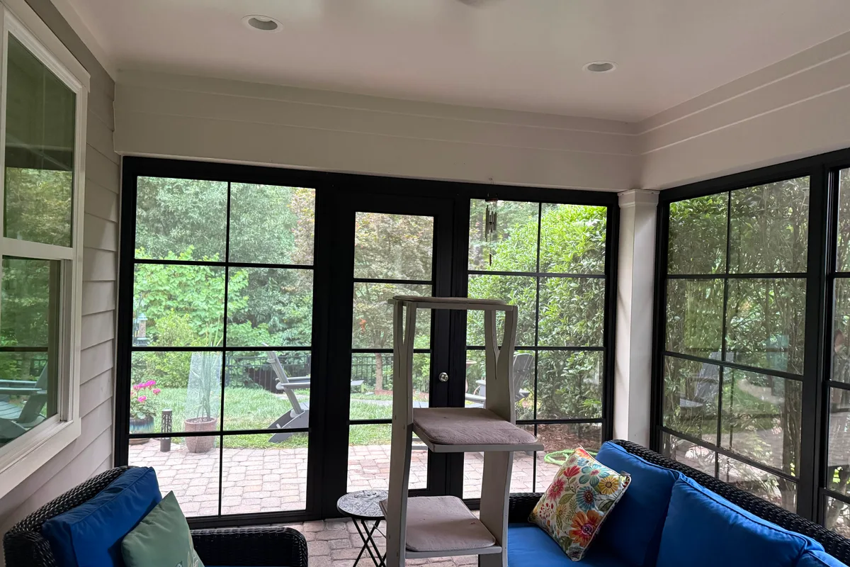 Completed vinyl film sunroom installation detail in Huntersville porch enclosure