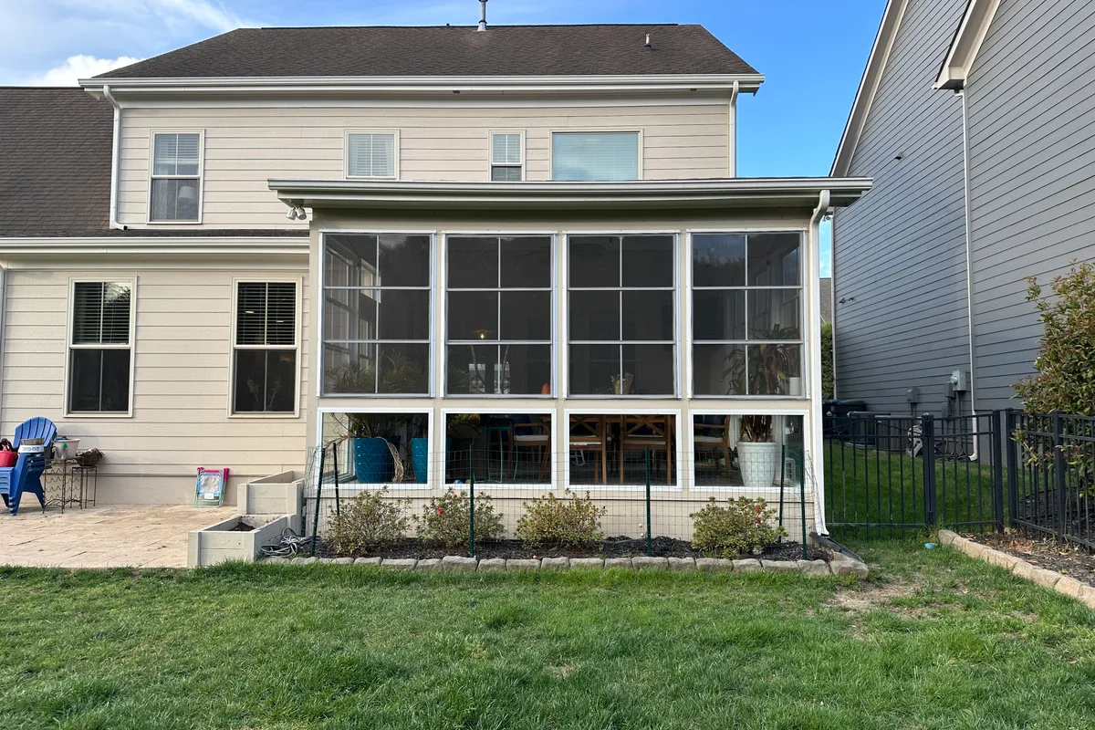 Pet door installed in Craft-Bilt swing door on Lancaster County SC porch enclosure