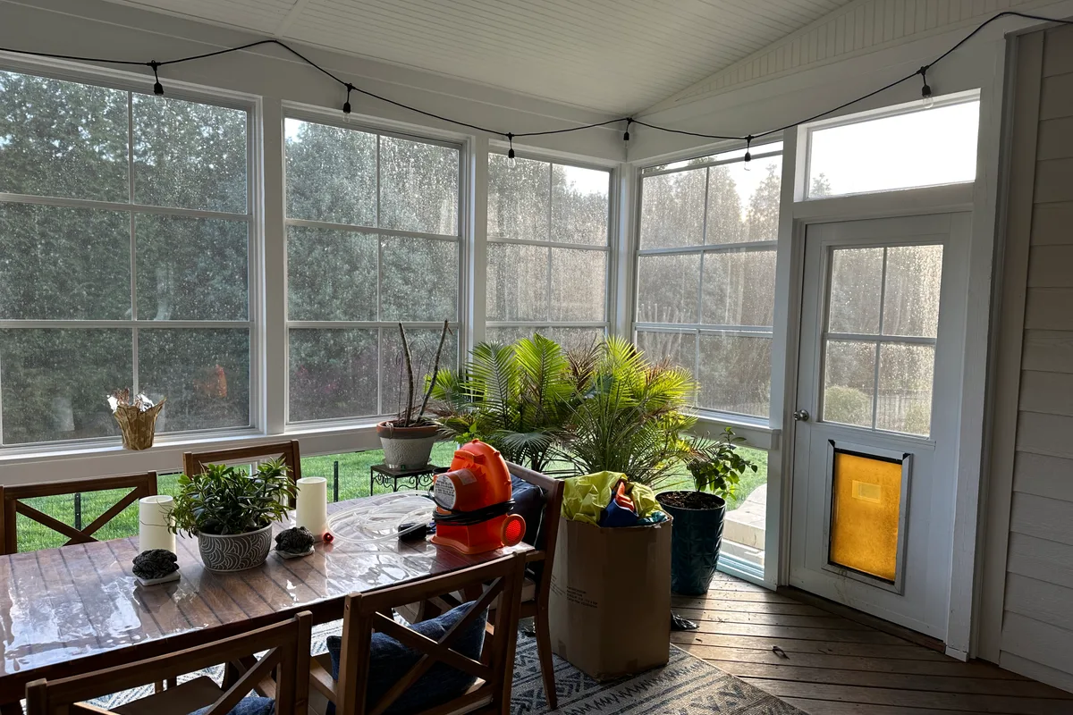 PGT single pane tempered glass fixed lite lower wall panels inside Indian Land 3-season room