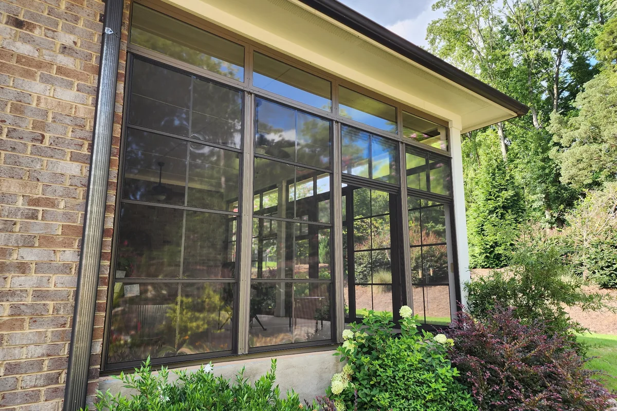 Completed 3-season vinyl film room addition exterior detail Mecklenburg County