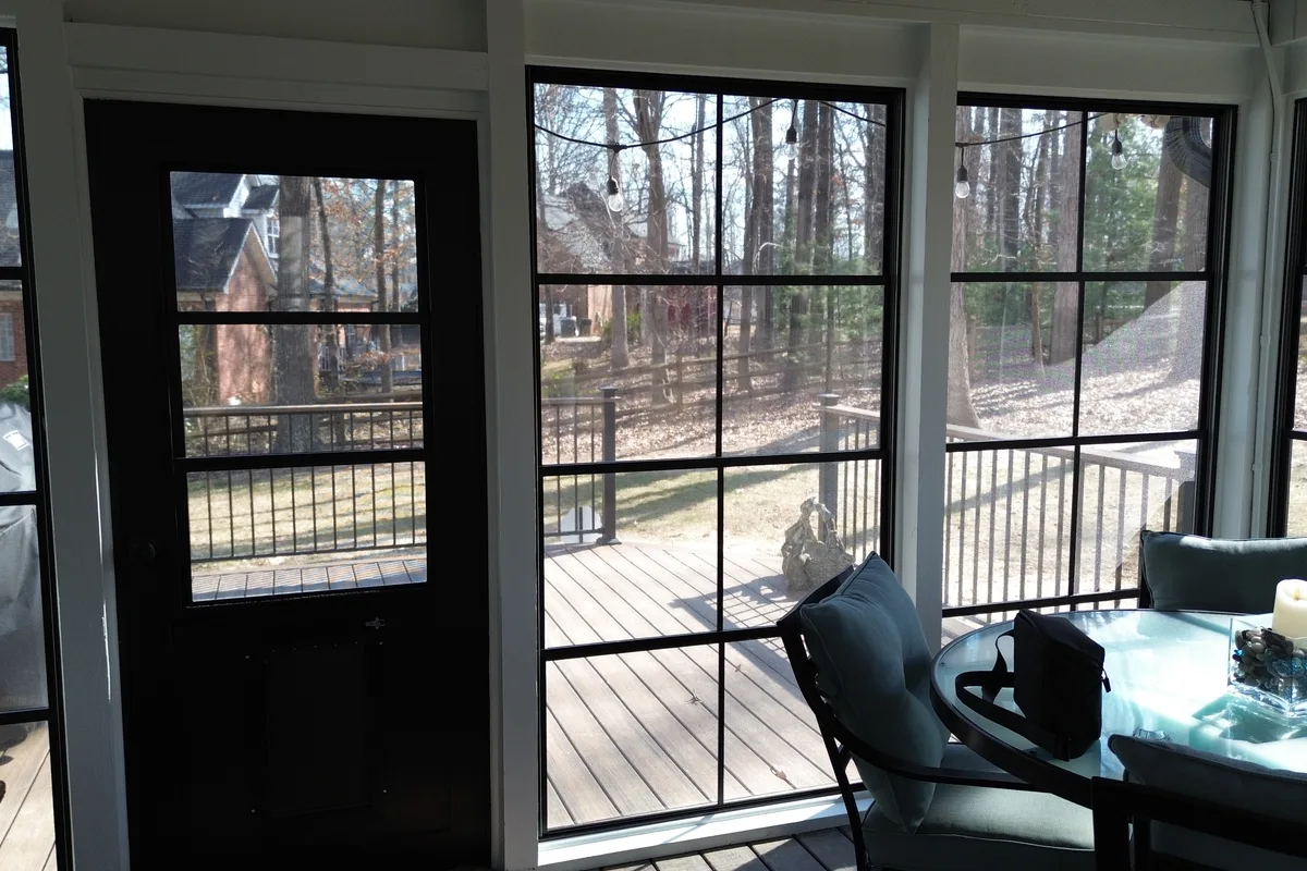 Vinyl film porch enclosure detail showing installation Monroe NC
