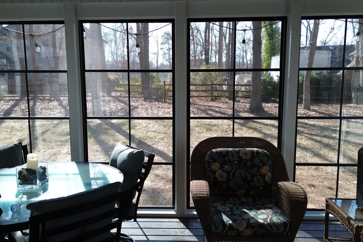 Installed vinyl film porch enclosure detail Charlotte NC contractor
