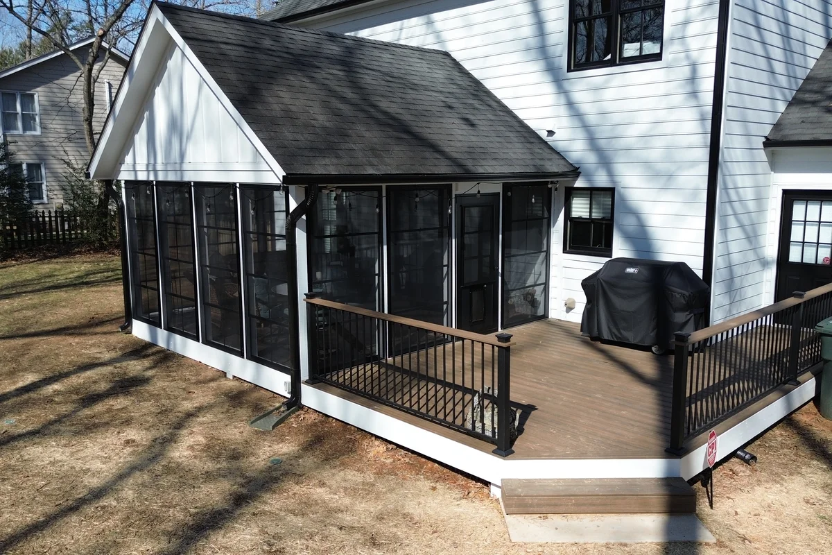 Finished 3-season vinyl film porch enclosure exterior view Monroe NC