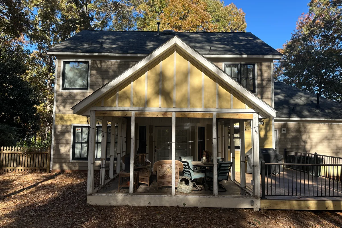 Exposed porch area before vinyl-film sunroom conversion Monroe