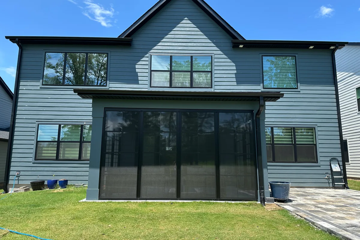 Vinyl film panels fully stacked open for maximum airflow on Tega Cay 3-season enclosure