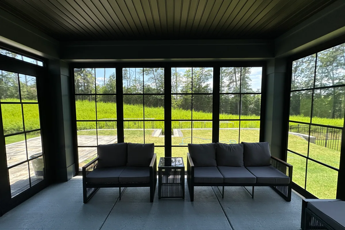 Craft-Bilt French door with fixed transom window installed in Tega Cay 3-season enclosure