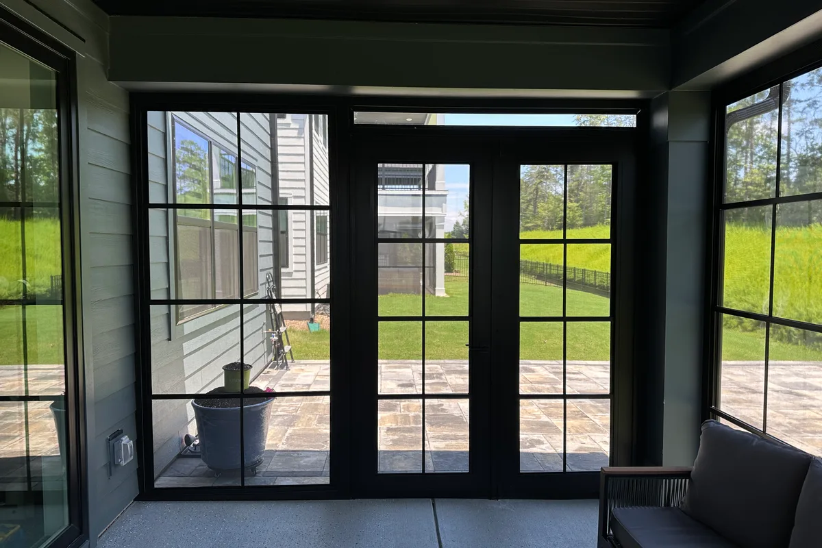 Full exterior view of completed 3-season vinyl film enclosure on Tega Cay home in York County SC