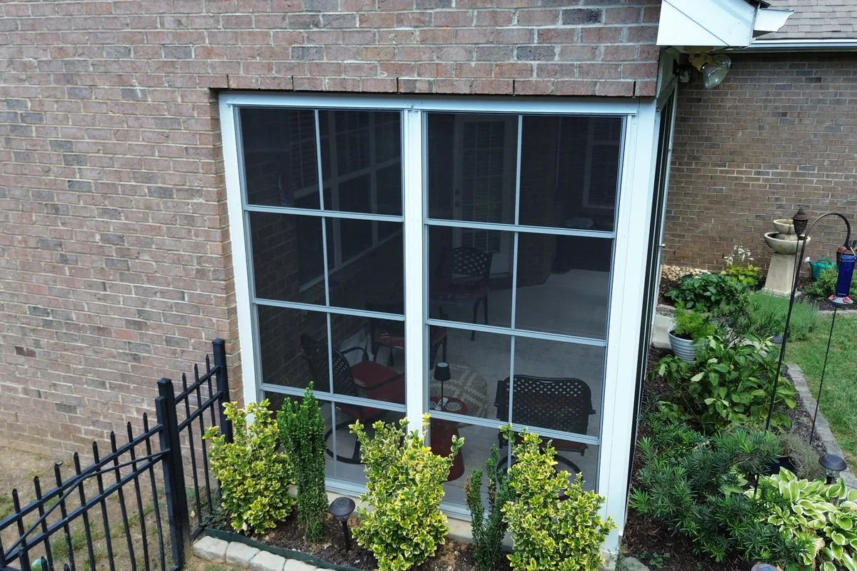 Completed porch enclosure detail Mecklenburg County 3-season vinyl