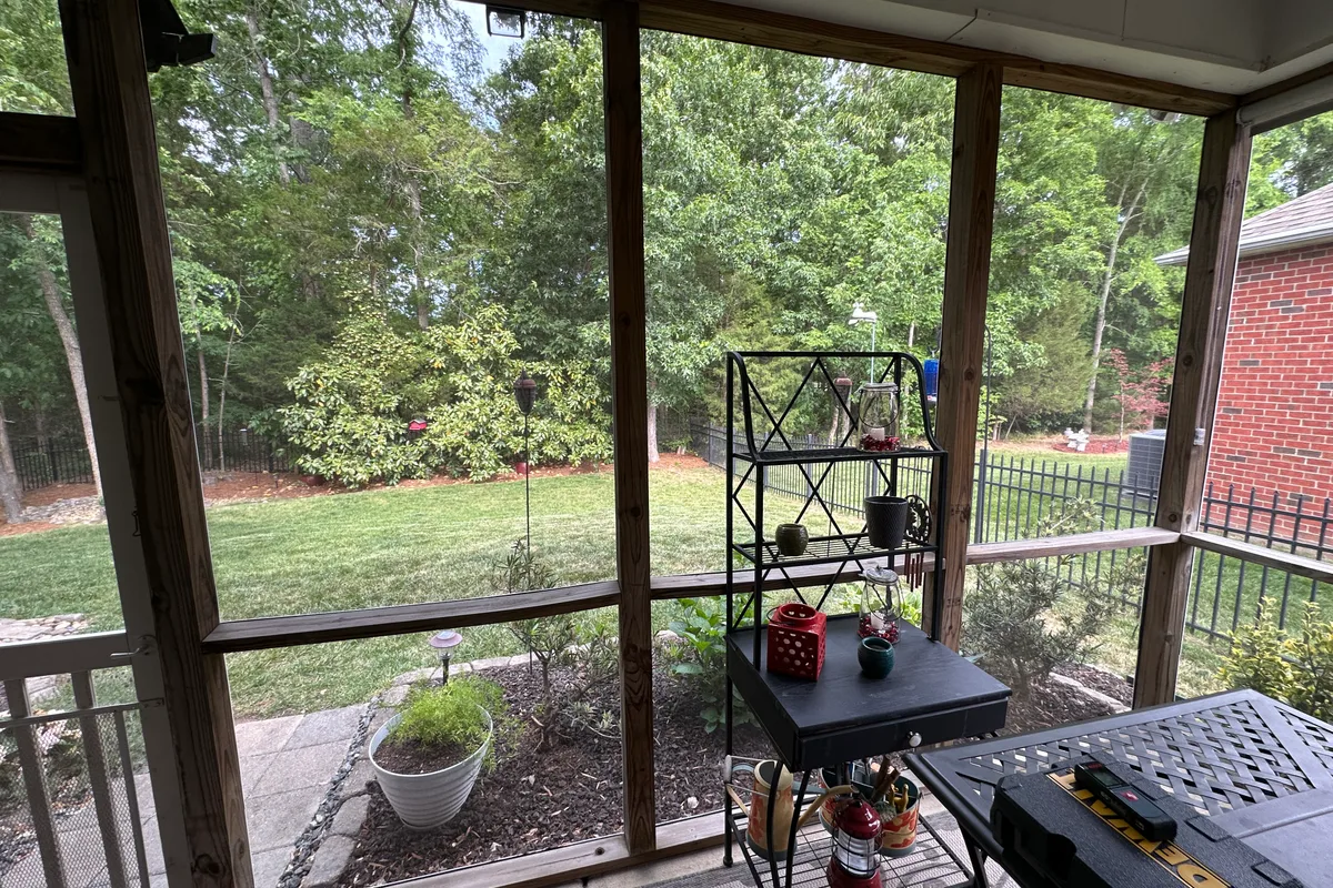 Open porch structure before vinyl film enclosure installation in Weddington NC