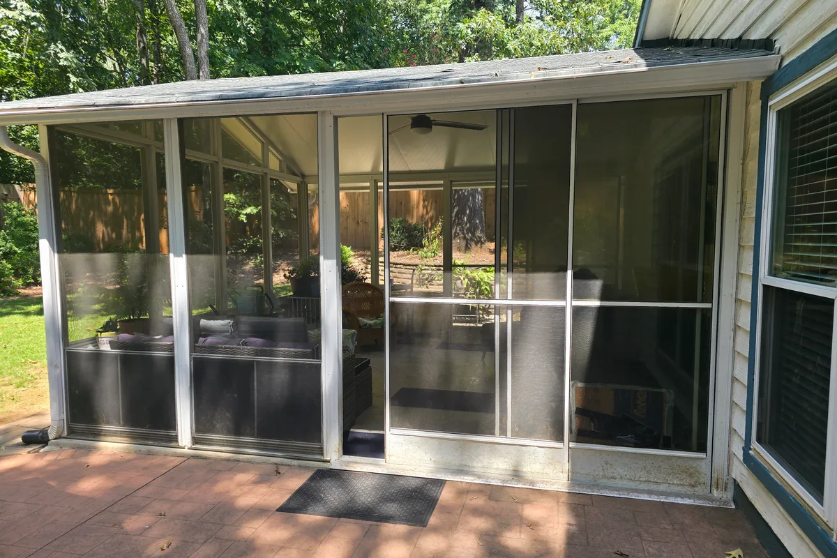 Original vinyl-film stacking windows before 4-season upgrade Mallard Creek NC