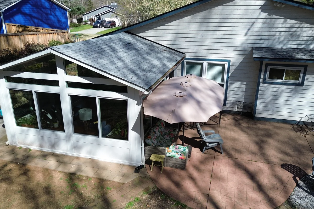 Finished 4-season sunroom exterior completed in Rainbow Forest Charlotte NC