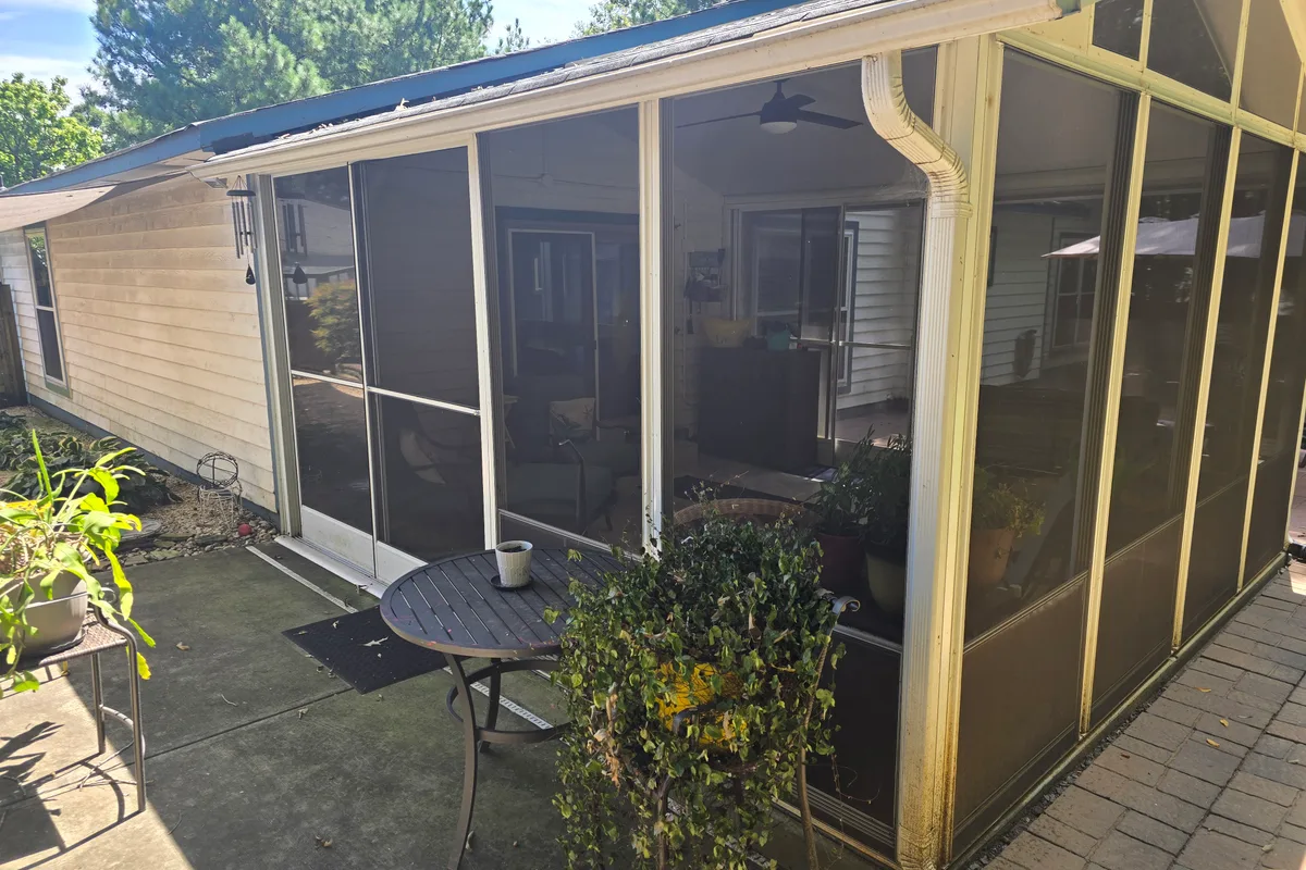 Existing porch structure before 4-season enclosure installation Charlotte