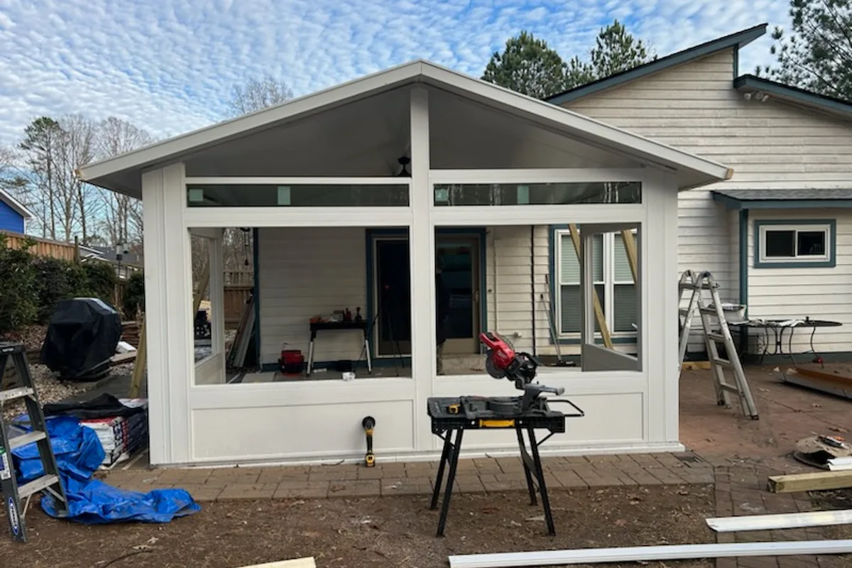 Year-round enclosure construction phases during 4-season room addition