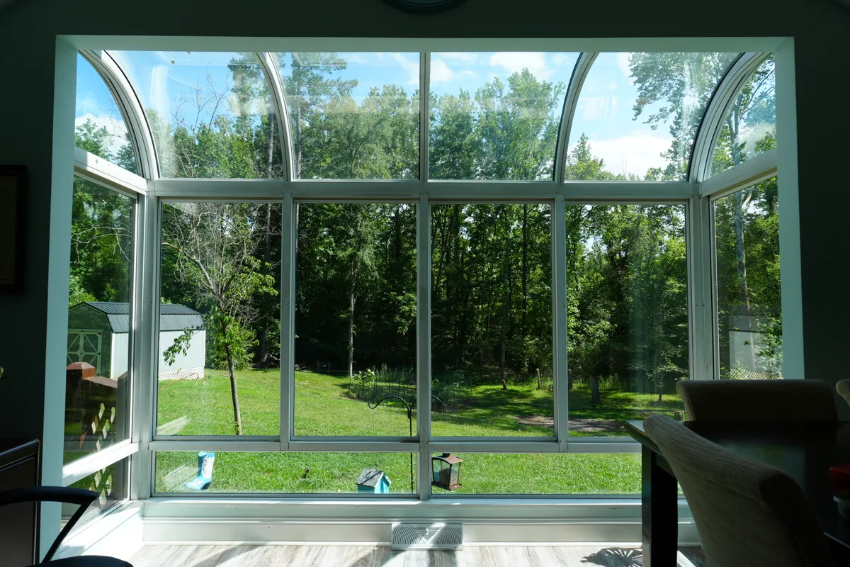 Year-round room addition detail showing durable 4-season materials Concord NC