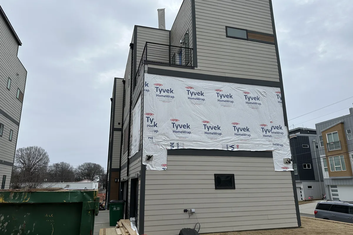 Existing porch structure before 4-season room addition in Charlotte