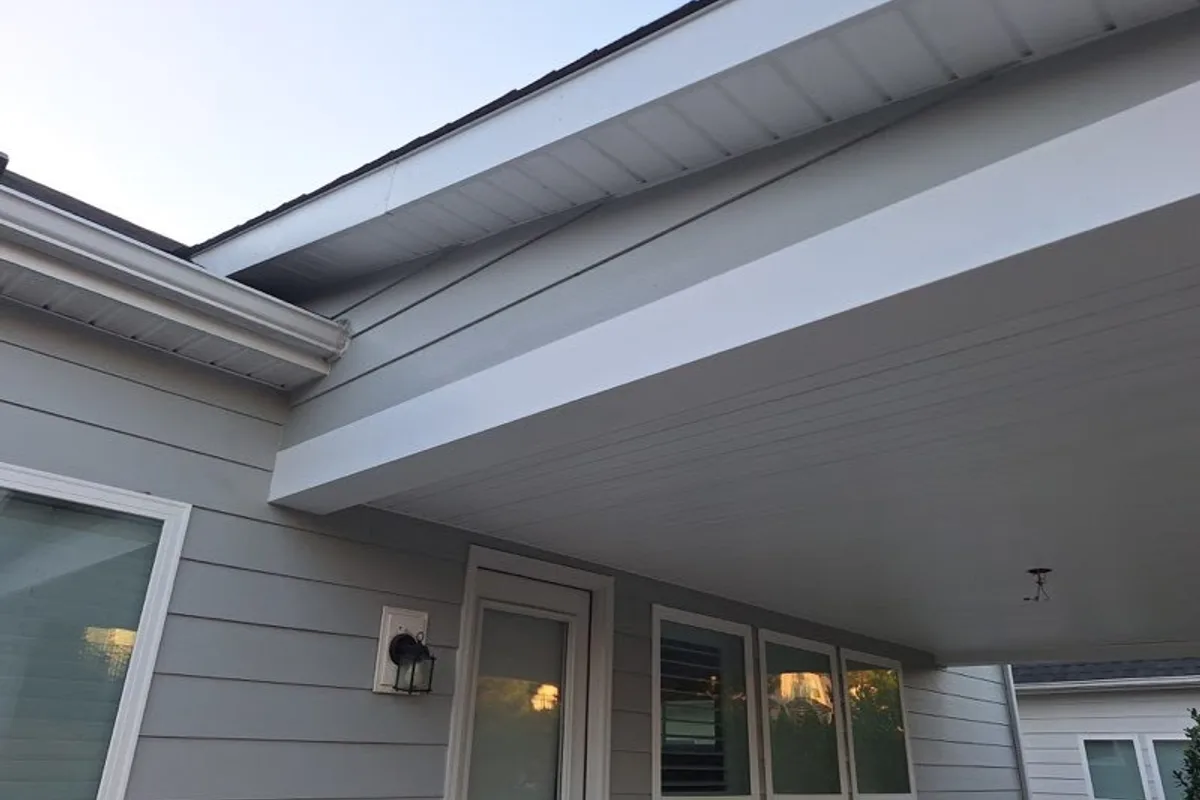 Completed covered patio detail showing quality roof installation work