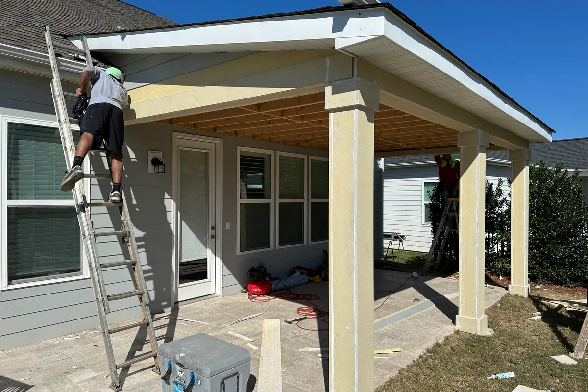 Roofing and patio cover construction in progress on Ancient Way Indian Land SC